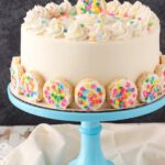 Baileys Frosted Vanilla Cookie Layer Cake on blue stand