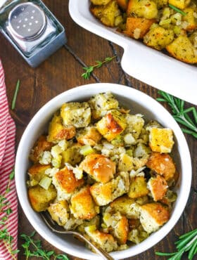 Classic Homemade Stuffing in a white bowl with a silver spoon