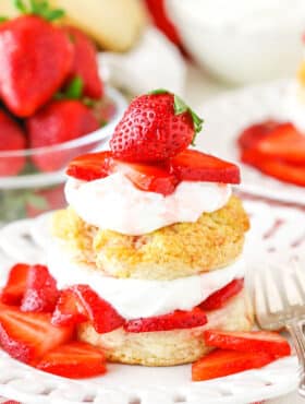 Shortcake biscuits with homemade whipped cream and strawberries.