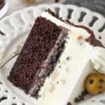 Overhead of a slice of ice cream cake on a plate.