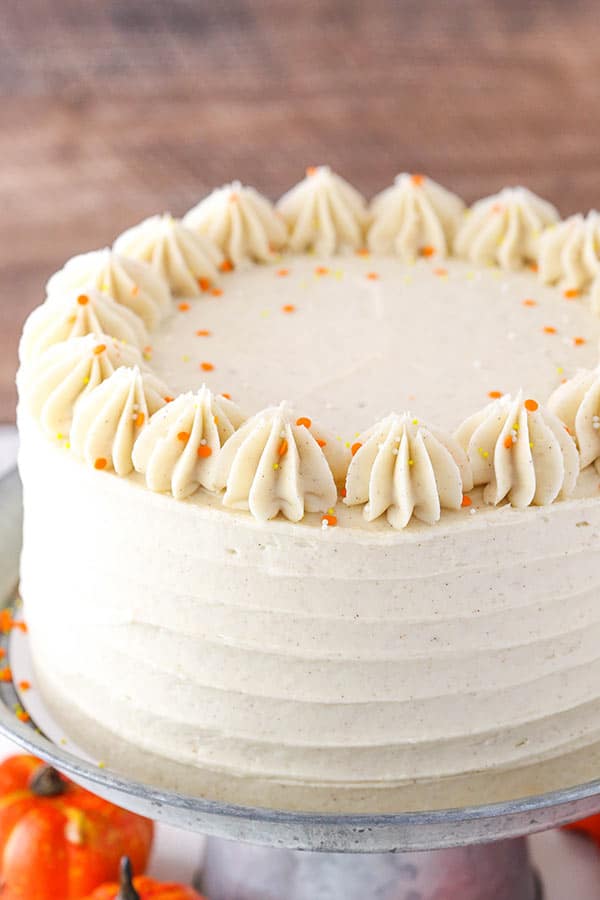 Pumpkin cheesecake cake with cinnamon cream cheese frosting.